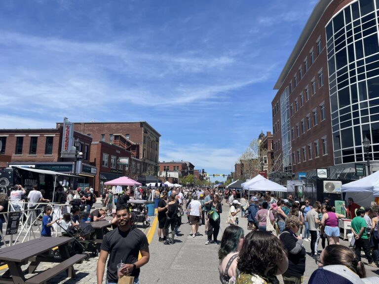 A street festival in downtown Concord on a sunny day